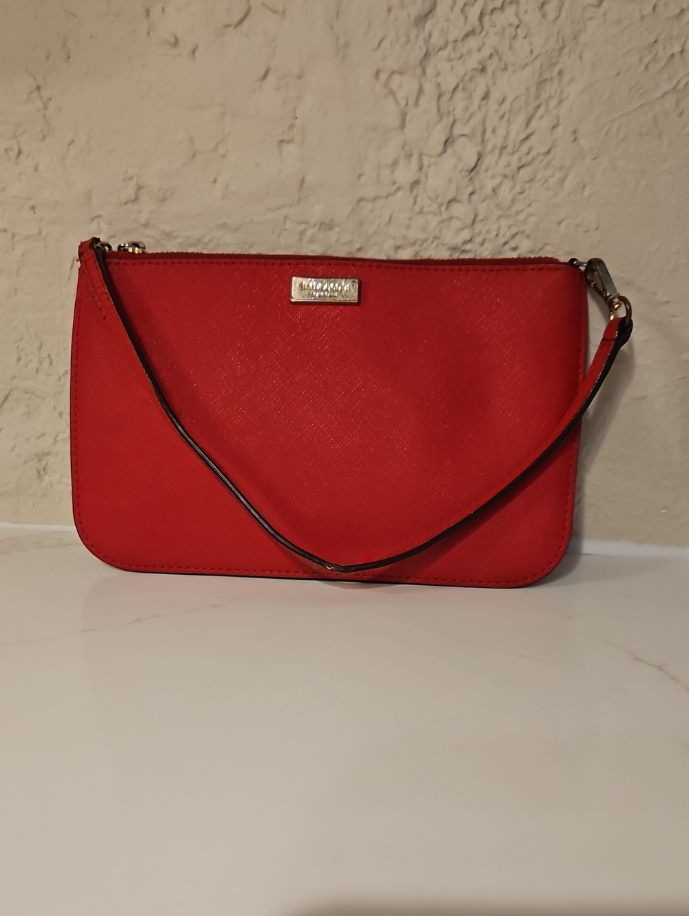 Red Kate Spade wristlet